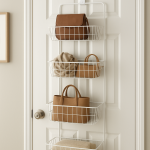 Over-the-door rack used for hanging bags and accessories in a small apartment.