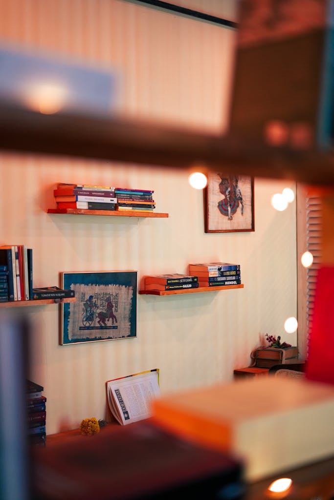Photo by Yunus Tuğ Floating wall shelves decorated with plants and jars in a small apartment kitchen